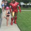 Iron Hero has lots of young fans at superhero parties.
