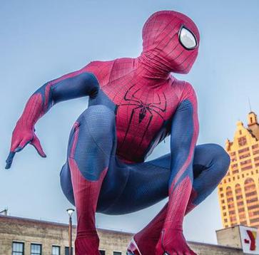 Spiderman poses at Houston superhero party